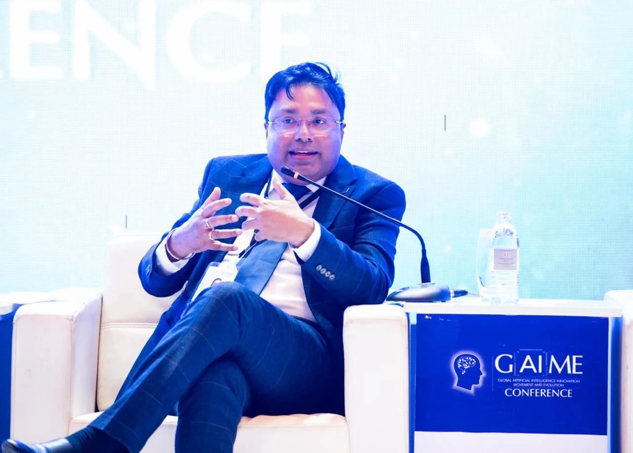 PK Das speaking at an AI conference